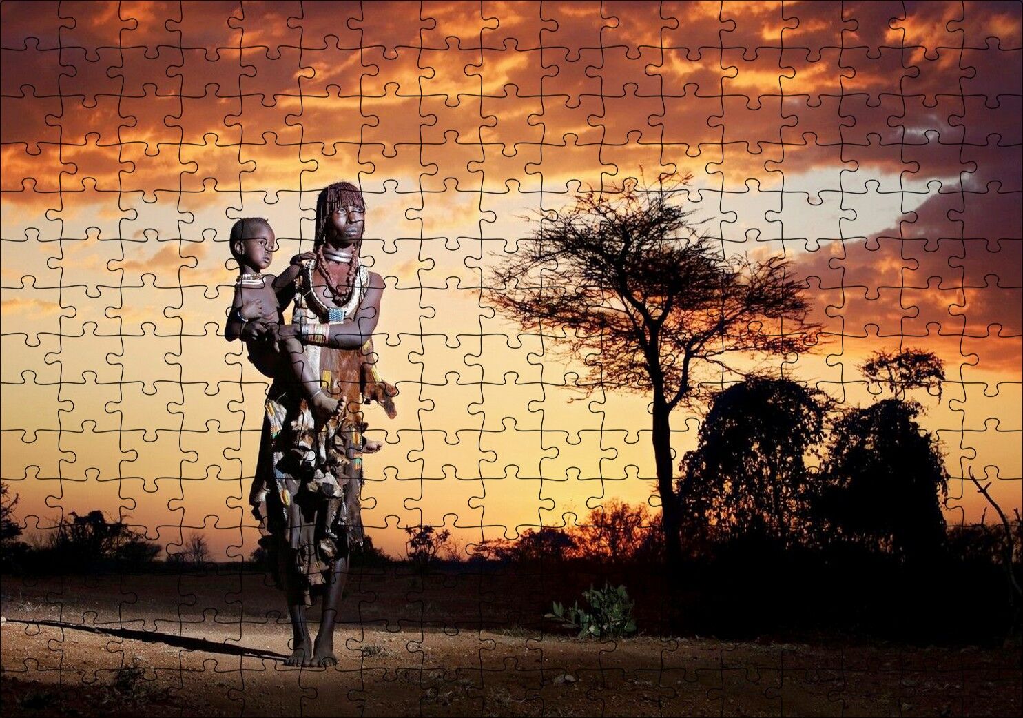Günbatımında Bulutlar ve Çocuğuyla Bir Afrika Kadını Puzzle Yapboz MDF Ahşap 255 Parça 34 cm X 49 cm